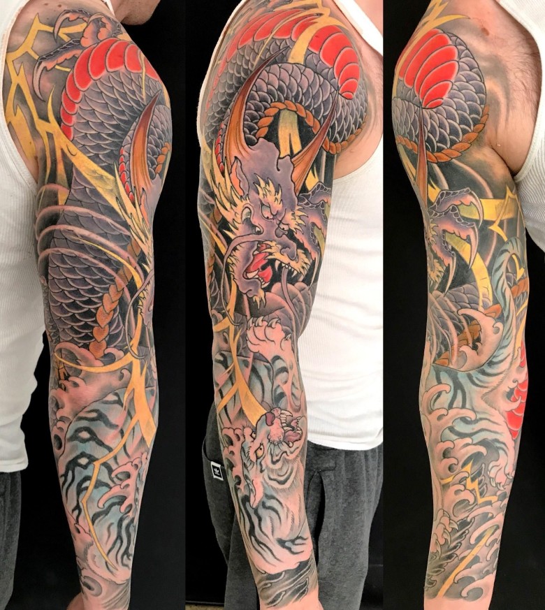 traditional japanese tattoo artist san francisco New Dragon and Tiger sleeve by Kevin Marr at Resolution SF San Francisco